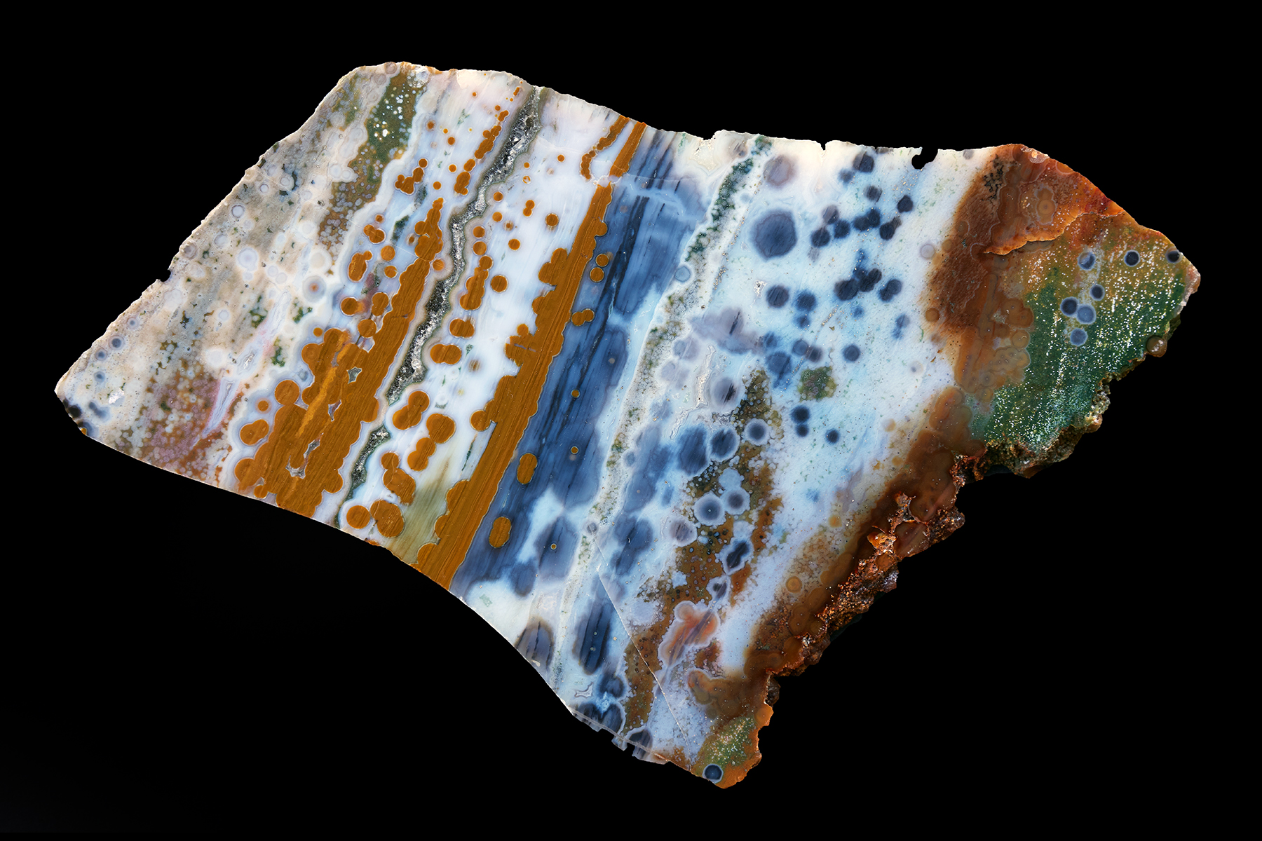 This Ocean Jasper Specimen measures 6.5 x 5" , is 6mm thick and weighs 258 grams.